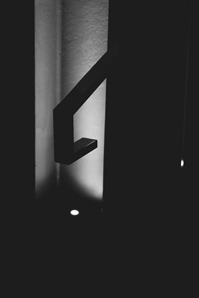 a black and white photo of a light in a room facebook messenger secret conversation screenshot notification.jpg