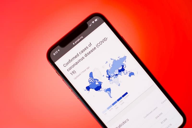 black samsung android smartphone on red surface google play store country settings app store change.jpg
