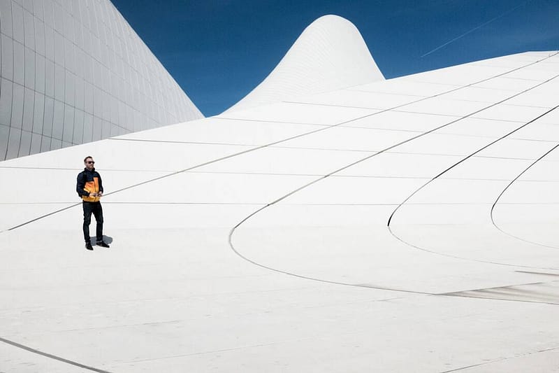 man in black and orange jacket under blue sky modern portfolio theme wordpress.jpg