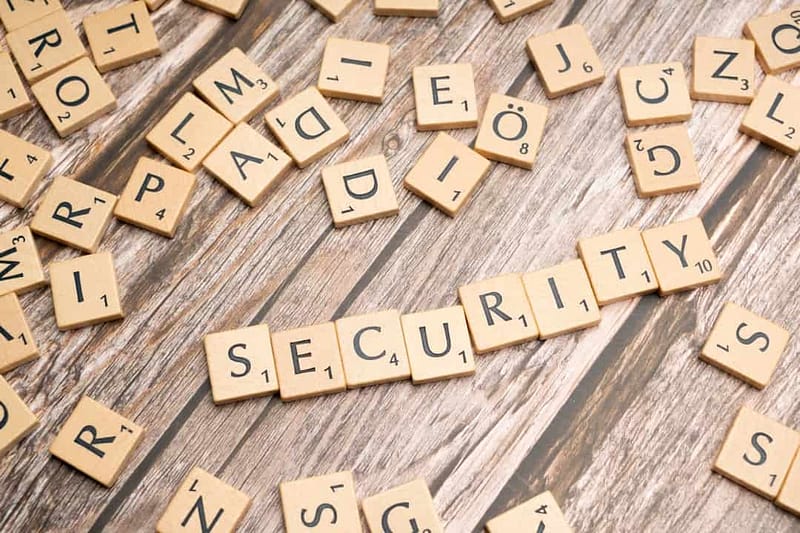 scrabble tiles spelling security on a wooden surface cybersecurity vpn service encrypted data.jpg
