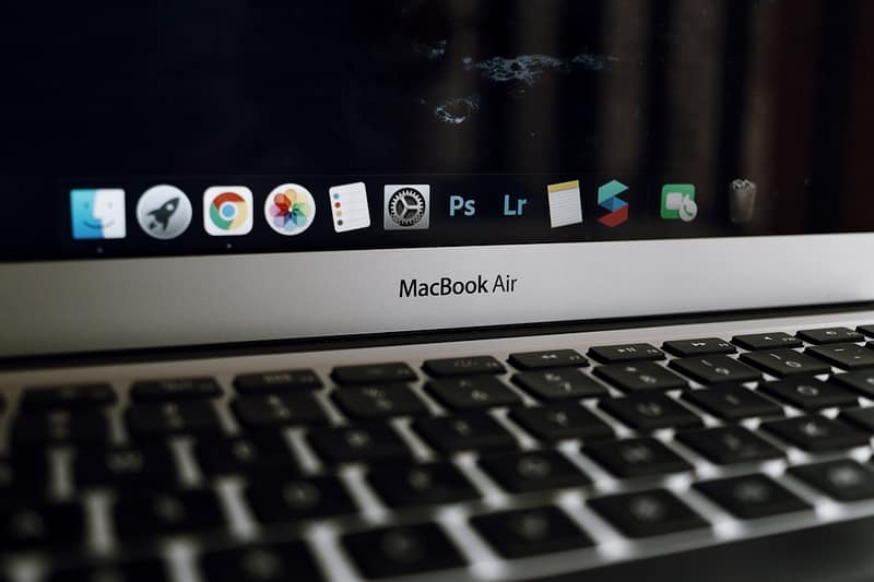 silver macbook air turned on showing icons mac finder autorecovery folder microsoft word.jpg