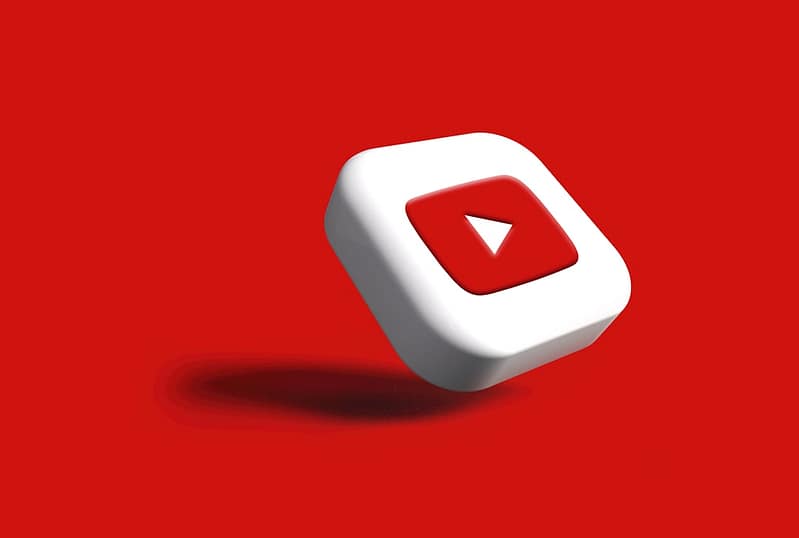 a white cube with a red arrow on a red background youtube tv premium channels subscription options.jpg