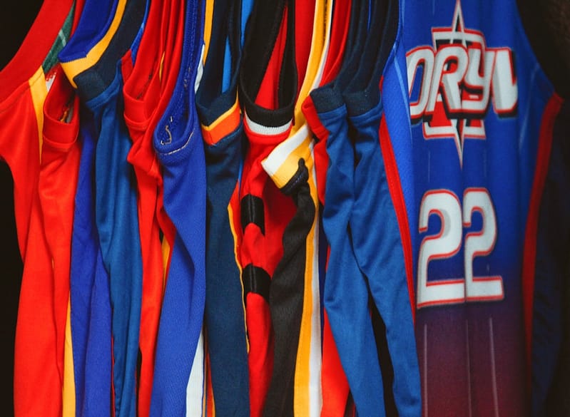 a group of blue and red sports jerseys volleyball logojersey printteam gear.jpg