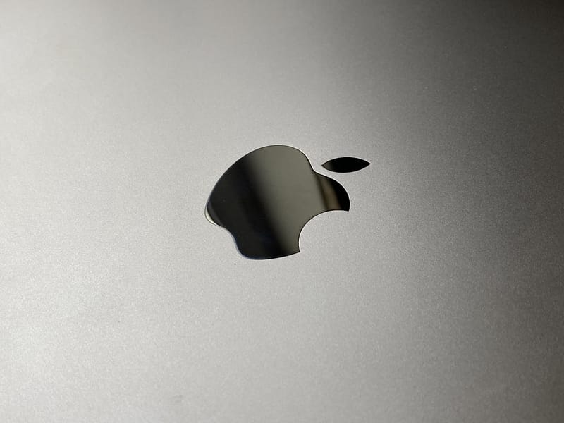 a close up of an apple logo on a silver surface macbook crash bitdefender kernel panic.jpg
