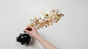 financial tips for millennial business owners piggy bank 300x168.jpg